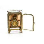 A 19th century continental gold lady's open faced pocket watch, presented in a small glass cabinet