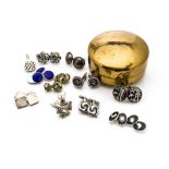 A large quantity of silver and base metal cufflinks, including two pairs decorated with fleur de