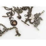 Five Victorian and 20th century silver watch chains, four curb link of differing sizes and one fancy