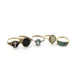 Five yellow metal gem set dress rings, comprising a 19th Century gold and enamel seed pearl set posy