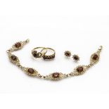 A 9ct gold garnet filigree style bracelet, together with two 9ct gold rings, and a pair of stud