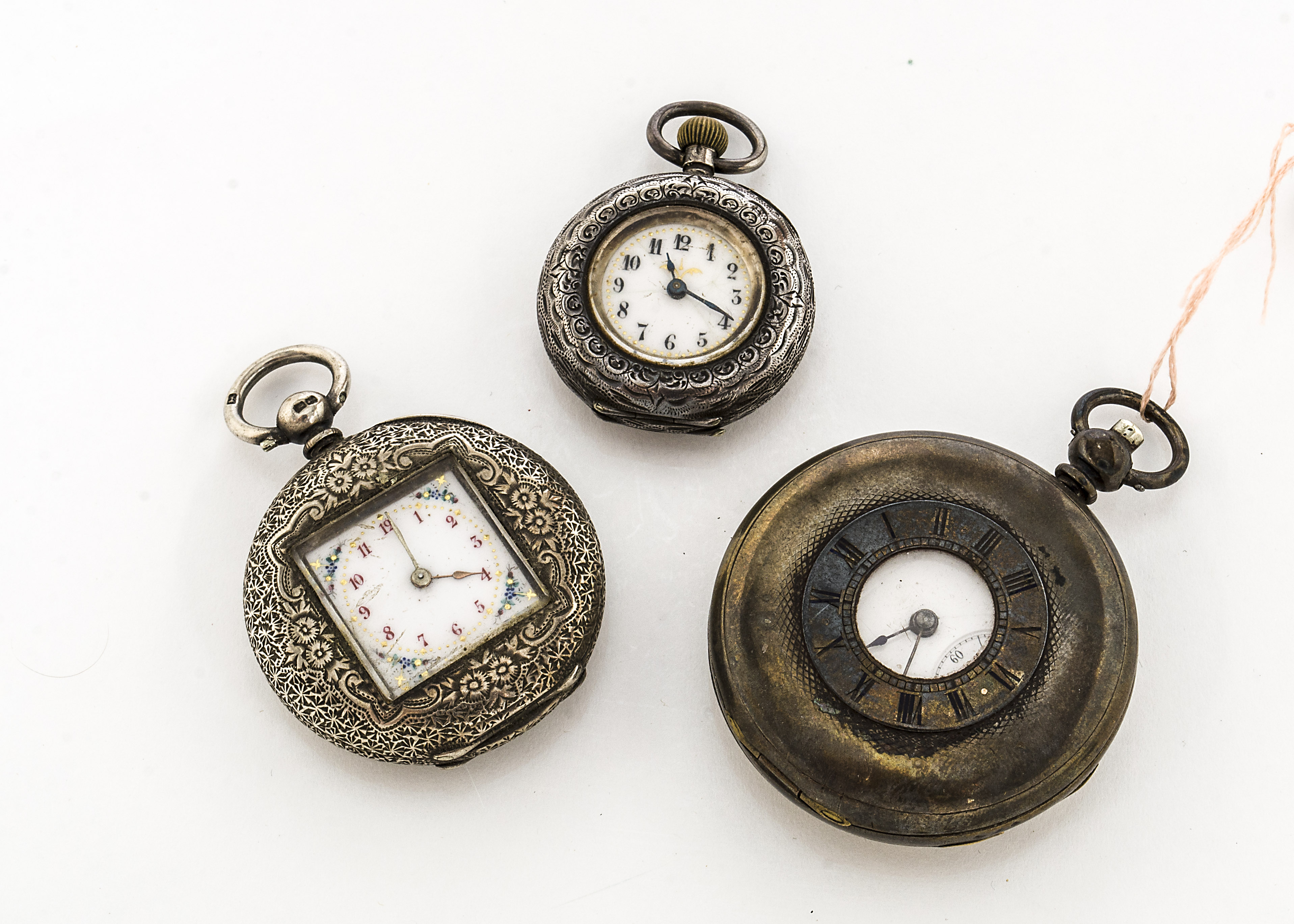 Three Victorian ladies silver pocket watches, one half hunter, another with squared window front