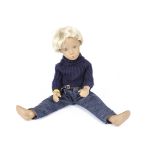 A Trendon Sasha Gregor Boy Doll with blonde hair, in original blue wool sweater and denim jeans, VG