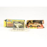 A Corgi Toys 261 James Bond Aston Martin, gold body, red interior, wire wheels, with bandit