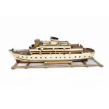 A large wooden model of Motor Yacht 'Lord Bryon', constructed in wood with metal detail, wooden