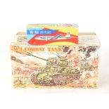 Taiyo Japan Tinplate Combat Tank and Chinese Air Plane, a battery operated M-4 tank, in original box