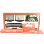 A Mamod Live Steam RS1 Train Set and Additional Track, the set containing RS 1 green locomotive, and