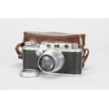 A Leica IIIa Camera, serial no. 316156, 1939, shutter working, body F-G, age-related wear, with a