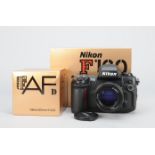 A Nikon F100 SLR Camera, shutter working, meter responsive, auto focus responsive, otherwise