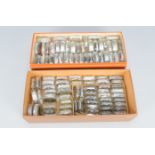 Cased Leitz Filters, Approximately 90 Leitz filters in maker's individual clear plastic cases,