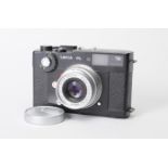 A Leica CL Camera, black, serial no. 1325294, 1973/4, shutter not working, body G, with a chrome
