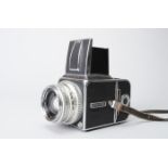 A Hasselblad 500C/M Camera, chrome, serial no UF143089, shutter working, body G, scratches to base