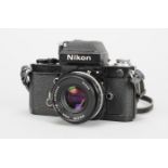A Nikon F2 A SLR Photomic Camera, black, serial no 7731590, shutter working, timer working, body