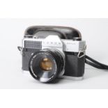 A Canonflex RM SLR Camera, serial no. 188615, chrome, shutter sticking at slow speeds, self timer