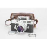 A Leica M3 Single Stroke Camera, chrome, serial no. 990933, 1960, self-timer, shutter working but