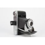 A Kershaw Curlew III Folding Camera, serial no 9077, with 105mm f/4.5 lens, shutter working, body G,