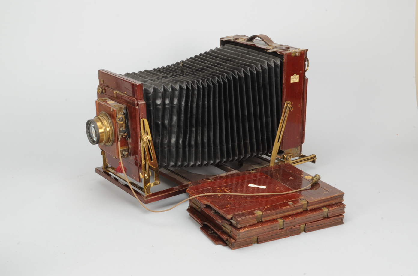 A late Thornton Pickard Royal Ruby Triple mahogany and brass Whole Plate Camera, with Ross Xpres