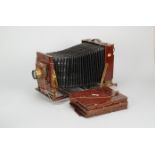 A late Thornton Pickard Royal Ruby Triple mahogany and brass Whole Plate Camera, with Ross Xpres
