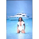 10 x 8 Advertising Transparencies, possibly by Patrick, Lord Lichfield, including Caroline Munro