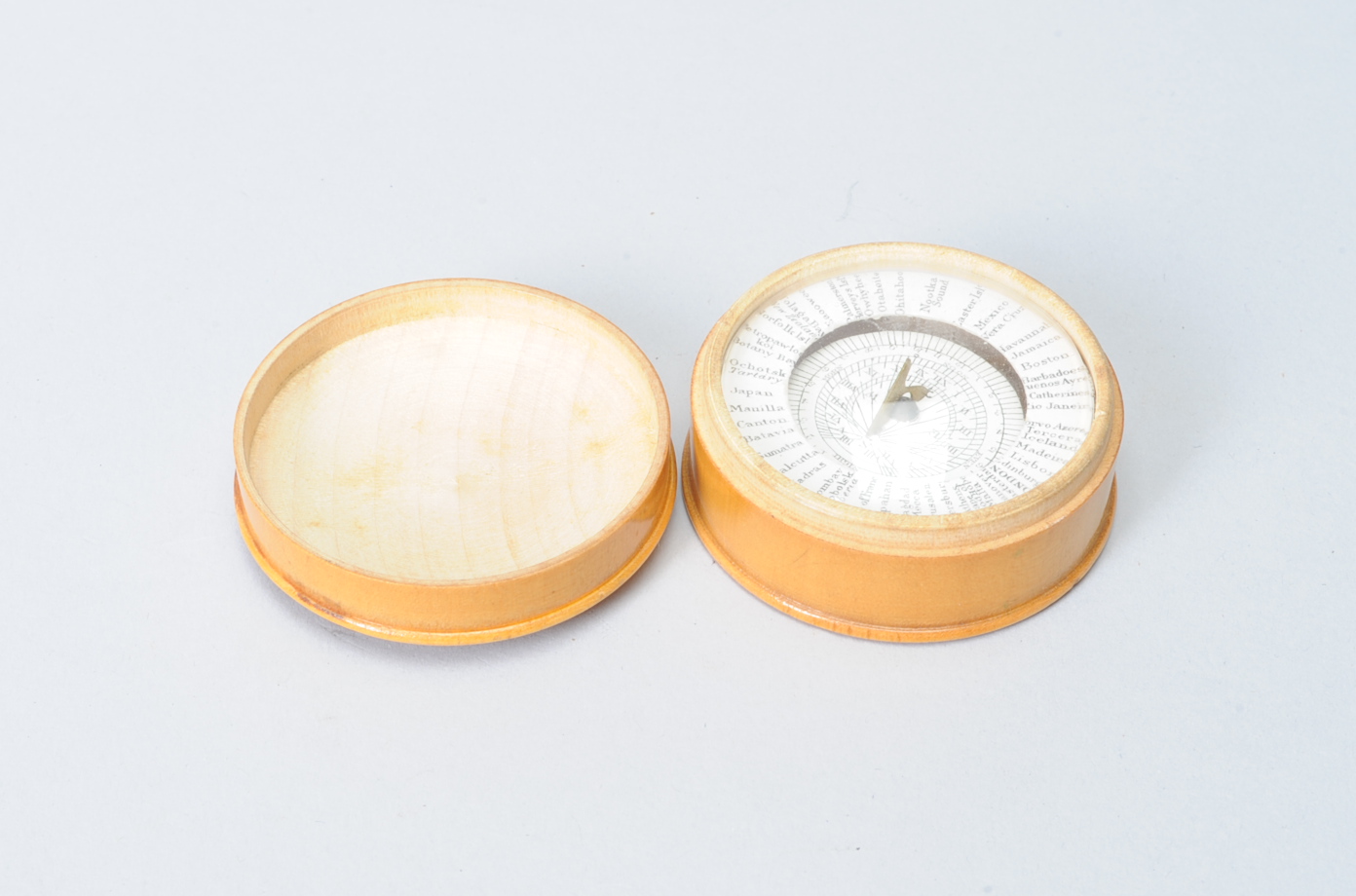 A 19th Century boxwood 'Patent Pantochronometer' Pocket Sun-Dial, with gnomon on 'floating' paper-