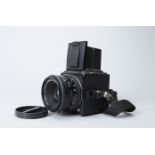 A Hasselbald 501CM Camera, black, serial no 10ER14337, shutter working, body G, some wear to back