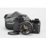 An Olympus OM-1 MD SLR Camera, black, serial no 1742163, shutter working, timer working, body VG,