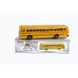 A Dinky Supertoys 949 Wayne School Bus, deep yellow body, black lines, red plastic hubs, in original