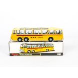 A Dinky Toys 961 Swiss Postal Bus, yellow body, cream roof, blue interior, PTT labels, in original