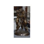 A bronze figural group titled 'The Three Graces', featuring three women embracing, height 74 cm