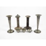 A pair of Chinese pewter candlesticks, with engraved floral decoration, height 16 cm, together