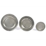 Fourteen 20th Century pewter circular plates, assorted sizes, together with a coloured glass lantern