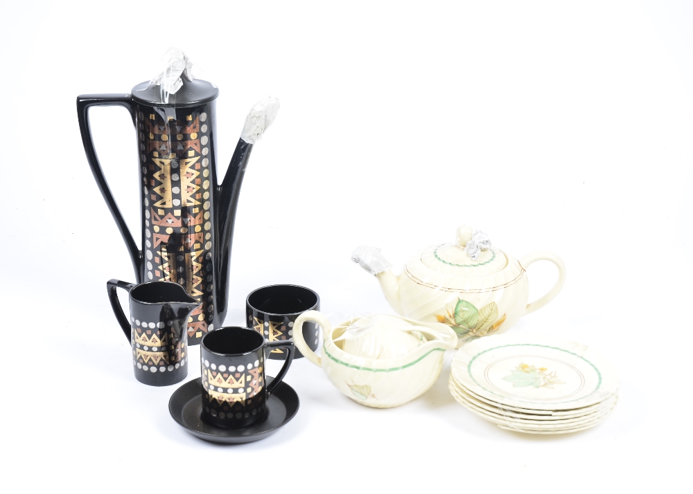 A Susie Cooper tea 'Woodlands' pattern tea service, consisting nine teacups, six saucers, four large