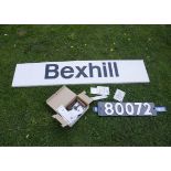 Railway Signs and Memorabilia, a BR black-on-white 'Bexhill' station sign, 12" x 60" long on flanged