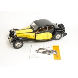 A Pocher kit built 1:8 scale Bugatti 1933 Type 50T, in black and yellow, with instructions and small