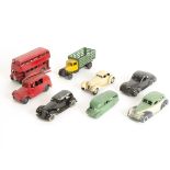 Post-war Dinky Vehicles, a collection of playworn/repainted private and commercial vehicles and