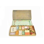 An unusual 1960's 'Gold' Monopoly set, with gilt covered box and board and solid plastic/Bakelite