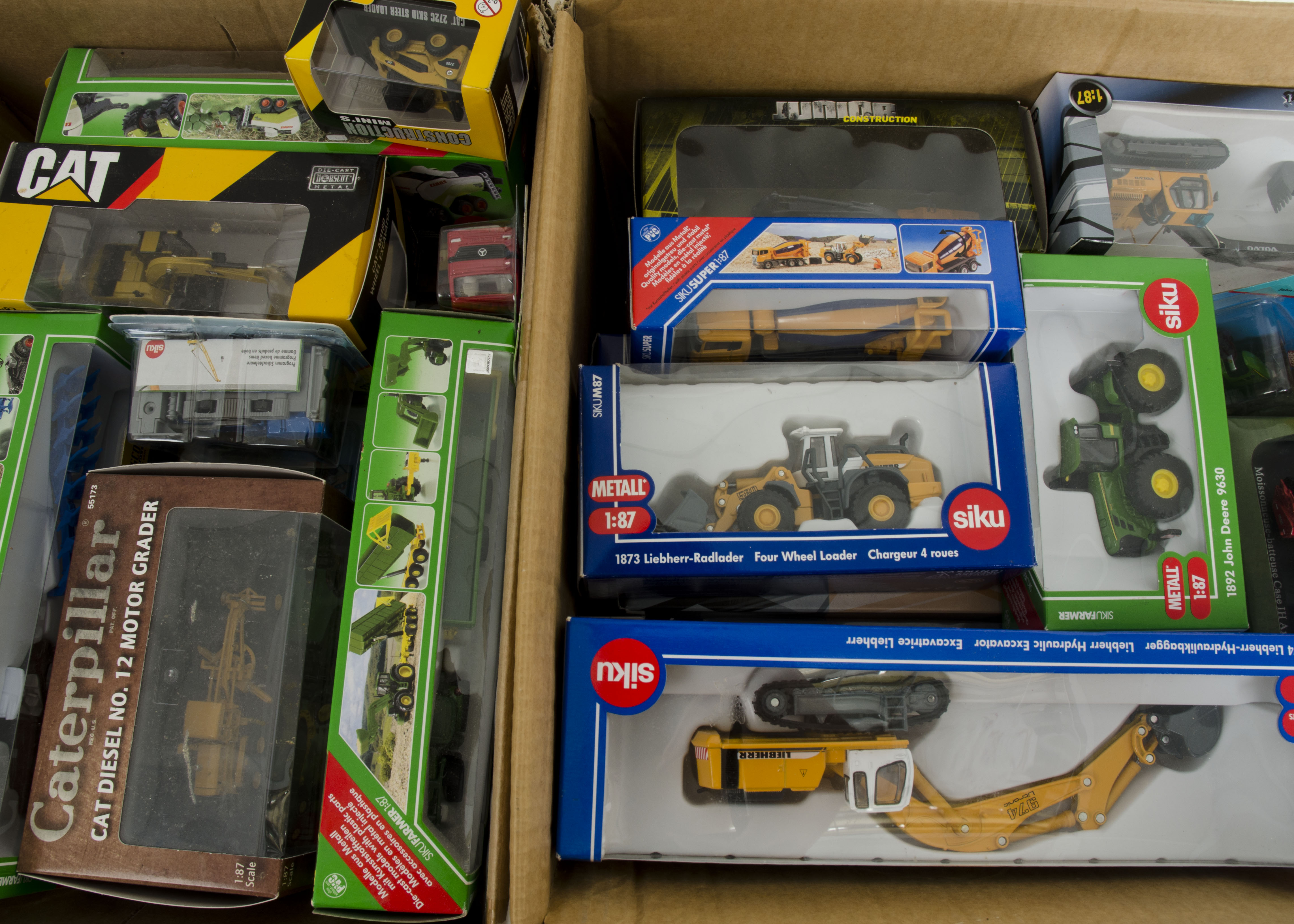 Modern Farm and Construction Vehicles, a boxed collection in various scales including examples by