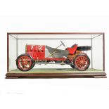 A Pocher kitbuilt 1:8 scale Fiat F2, in red and black, presented in a DSC glass/wood Showcase, VG,