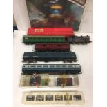 A Mixed Lot of 009 and OO Gauge Trains, with blue Egger Bahn 0-4-0T loco no 5, balcony van and 6