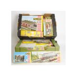 Unmade HO Scale Kit Buildings by Faller, mostly earlier issues in red/white-striped yellow boxes,