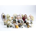 An extensive collection of forty plus decorative eggs including ceramic, glass and marble