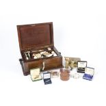 A treen sewing box together with a group of costume jewellery pins and tie clips, including a