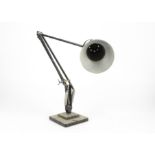 A Metropolitan/Vickers desk office fan, height 41 cm, with an angle poise lamp by Herbert Terry &