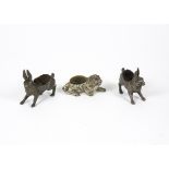 A pair of bronze nib wipes modelled as rabbits, length 7 cm, together with a painted bronze pin