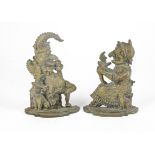 A pair of Punch and Judy heavy brass doorstop figures, Punch with a small dog by his side, Judy with