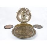 An Egyptian copper silver inlaid charger with central roundel of Nefertiti, together with four other