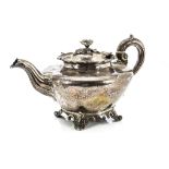 A William IV silver teapot by the Barnards, London 1836, with flower finial, shaped rim on