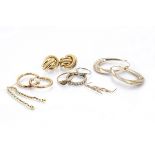 Three gold rings, together with a quantity of gold earrings, mostly textured, 14g