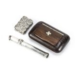 A Victorian silver vinaigrette by RM, together with a silver pencil holder and a wooden snuff box (