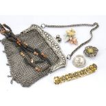 A collection of costume jewellery, including an art nouveau lily of the valley silver plated chain